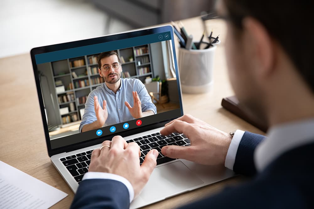 Webcam operator on laptop